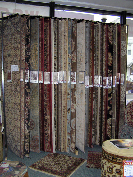 custom area rugs rack